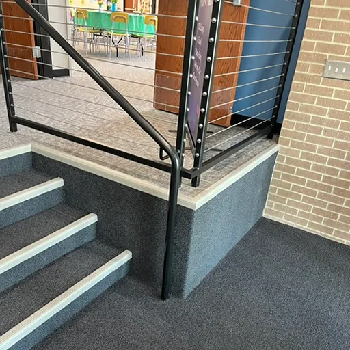 St. Olaf Church entry commercial carpet installation and stairs